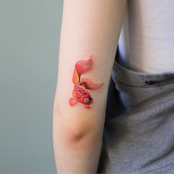 Значение татуировки золотая рыбка