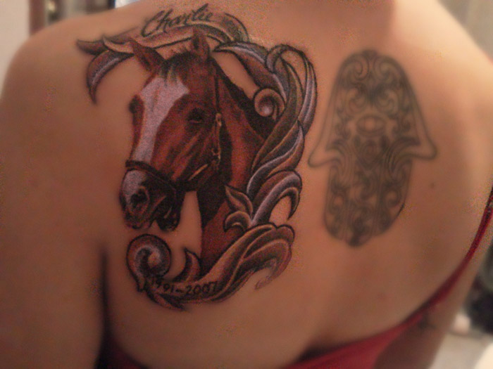 Значение татуировки конь