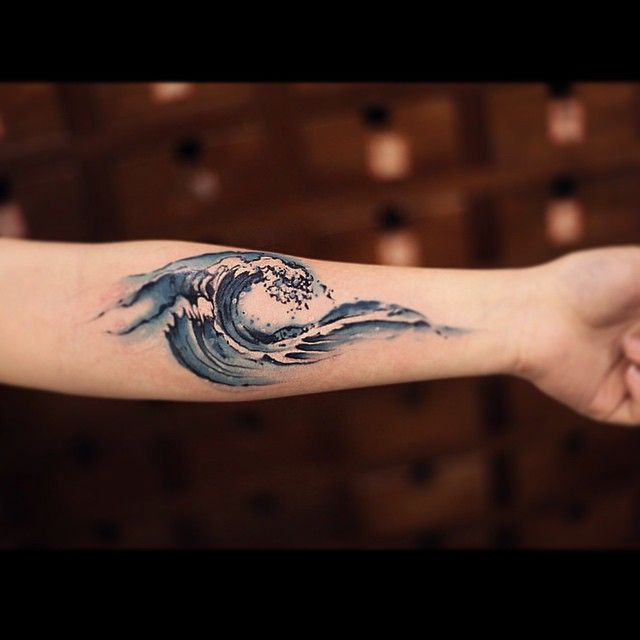 Значение татуировки волна