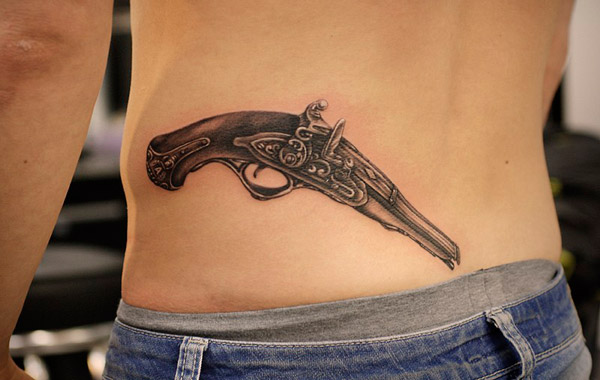Значения татуировки «Пистолет»
