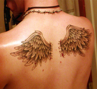 Значение татуировки крылья